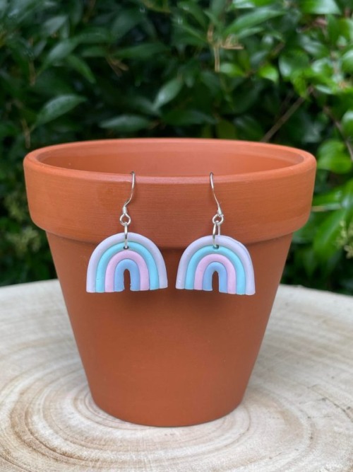 rainbow shaped earrings on hook